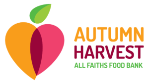 A green background with an apple and the words autumn harvest.