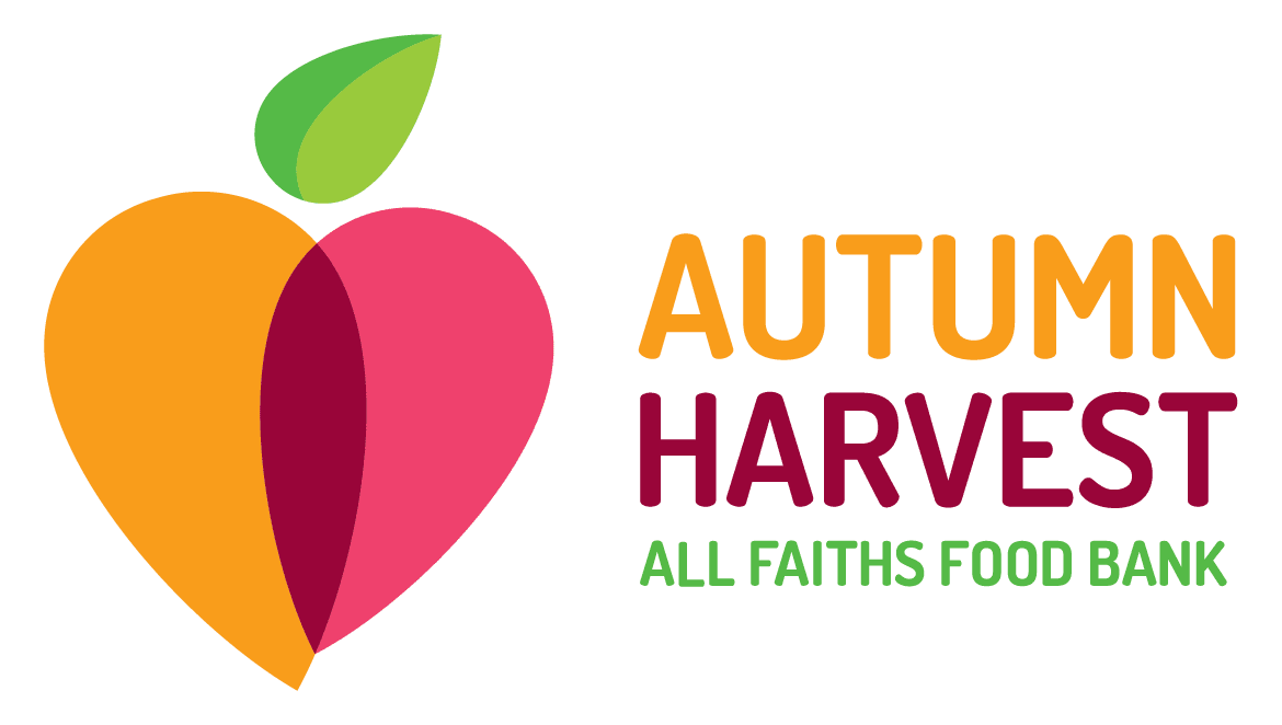 A green background with an apple and the words autumn harvest.